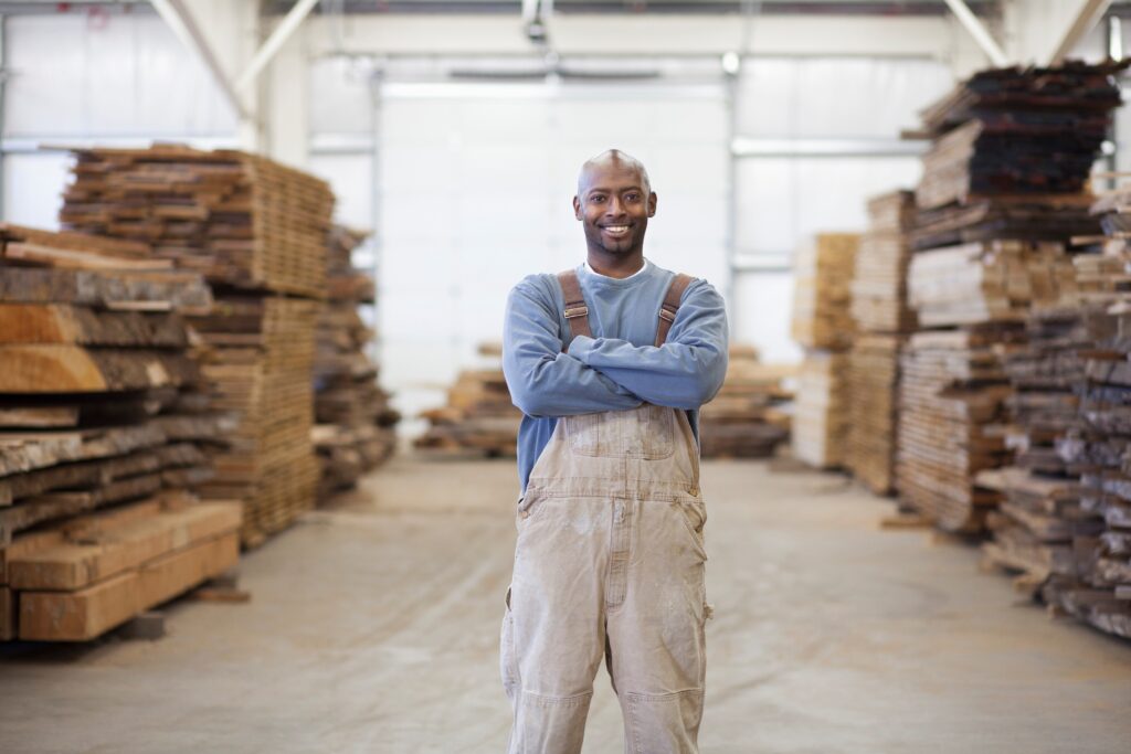 Man in Timber Warehouse